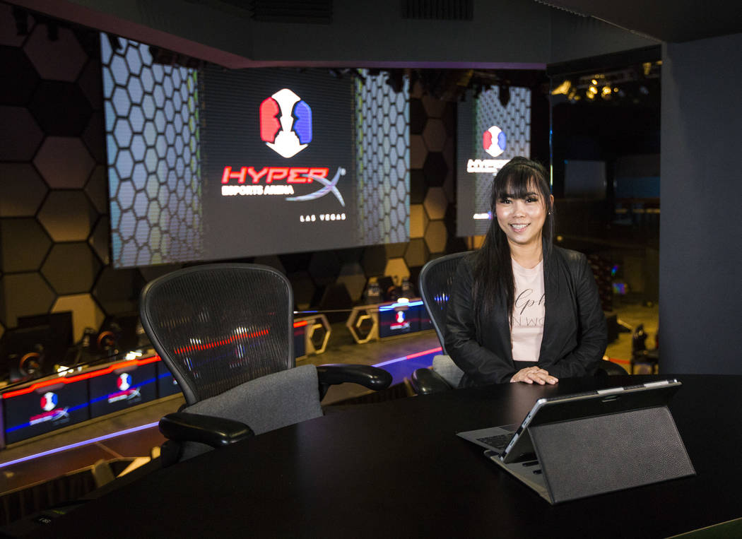 Grant recipient Obe Wan poses for a portrait while exploring the production room during a visit to the HyperX Esports Arena at the Luxor as part of the 1,000 Dreams Fund's BroadcastHER Academy Cha ...