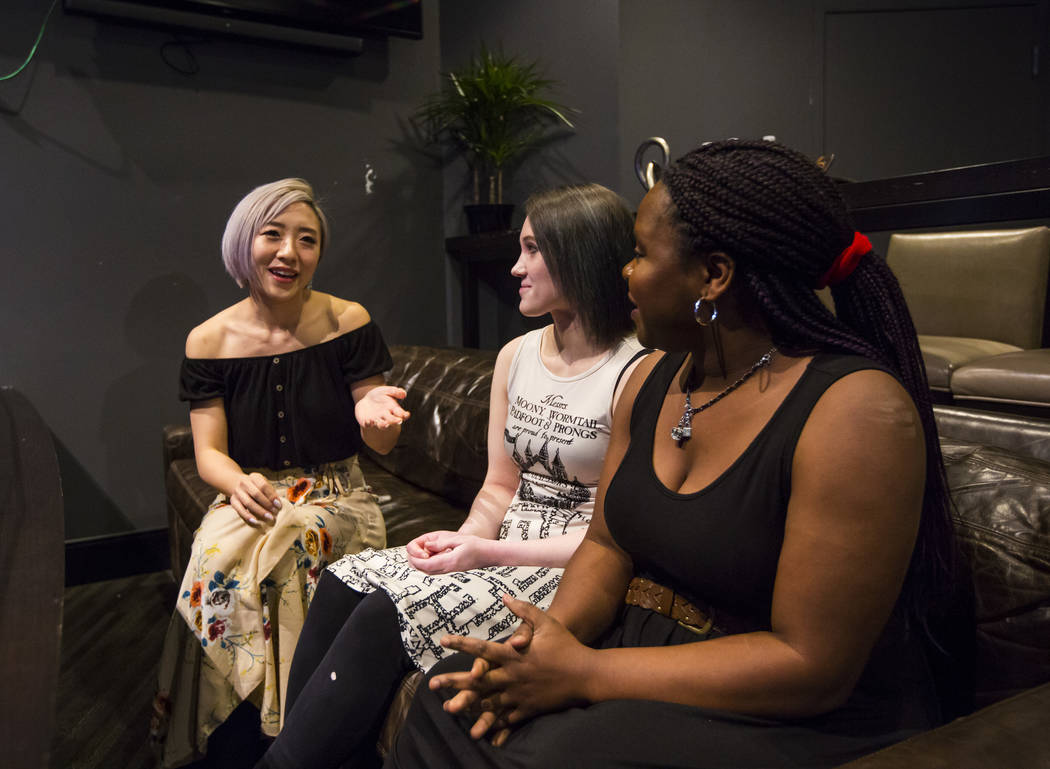 Cosplayer and influencer Stella Chuu, left, talks with grant recipients Giselle Colon, center, and Alesha DeBose while visiting the HyperX Esports Arena at the Luxor as part of the 1,000 Dreams Fu ...
