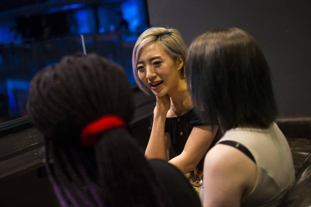 Cosplayer and influencer Stella Chuu talks grant recipients Alesha DeBose, left, and Giselle Colon while visiting the HyperX Esports Arena at the Luxor as part of the 1,000 Dreams Fund's Broadcast ...