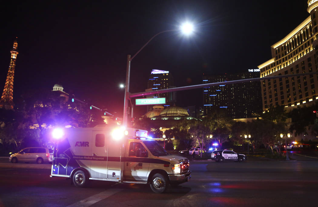 An ambulance heads to the Bellagio after police fired at a robbery suspect in Las Vegas on Friday, March 15, 2019. (Chase Stevens/Las Vegas Review-Journal) @csstevensphoto