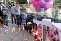 Pasha Weaver, 22, wearing white sunglasses, speaks during a vigil on Saturday, March 16, 2019, in North Las Vegas for her sister and 2-year-old niece: Sierra Robinson and Noelani Robinson. Police ...