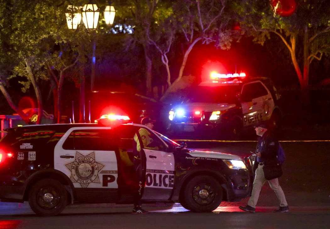 Las Vegas police officers investigate outside of the north valet at the Bellagio after police fired at a robbery suspect in Las Vegas on Friday, March 15, 2019. (Chase Stevens/Las Vegas Review-Jou ...