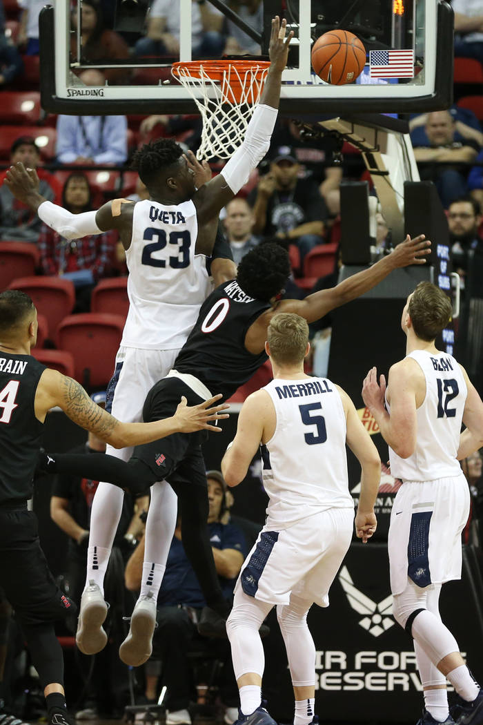 Utah State Aggies center Neemias Queta (23) makes a block against San Diego State Aztecs guard Devin Watson (0) in the second half of the Mountain West tournament men's basketball championship gam ...
