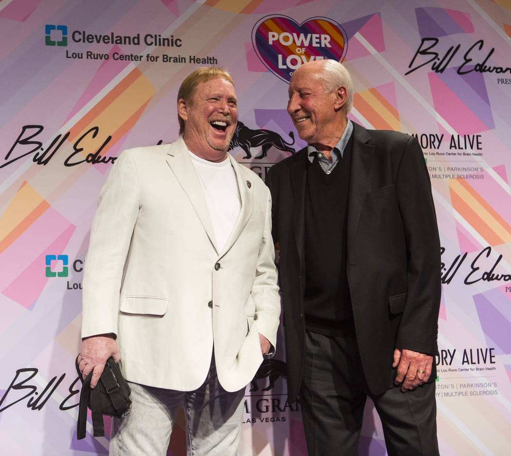 Oakland Raiders owner Mark Davis, left, poses with former Raiders player and coach Fred Biletnikoff on the red carpet for Keep Memory Alive's 23rd annual Power of Love gala, raising money for Clev ...