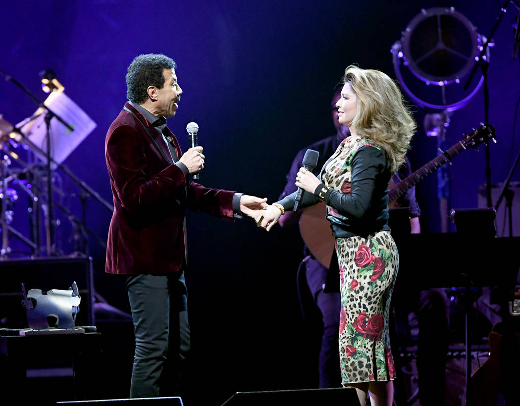Lionel Richie and Shania Twain speak during the 23rd annual Keep Memory Alive 'Power of Love Gala' benefit for the Cleveland Clinic Lou Ruvo Center for Brain Health at MGM Grand Garden Arena on Ma ...