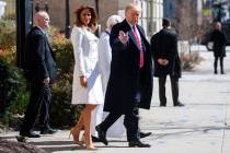 President Donald Trump and first lady Melania Trump, with Reverend Bruce McPherson, walk to their motorcade after attending service at Saint John's Church in Washington, Sunday, March 17, 2019, en ...