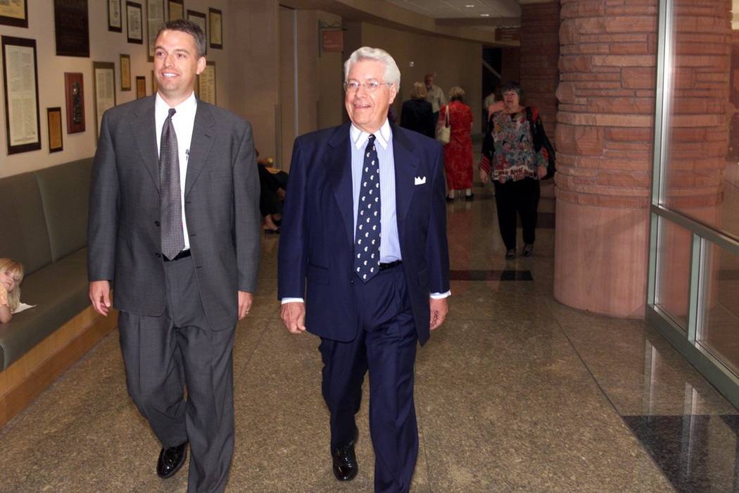 Richard Bunker, right, walks into the Clark County Government Center with his son Morgan to file as a candidate for Nevada State Senate district 9 May 20, 2002. (K.M. Cannon/Las Vegas Review-Journal)