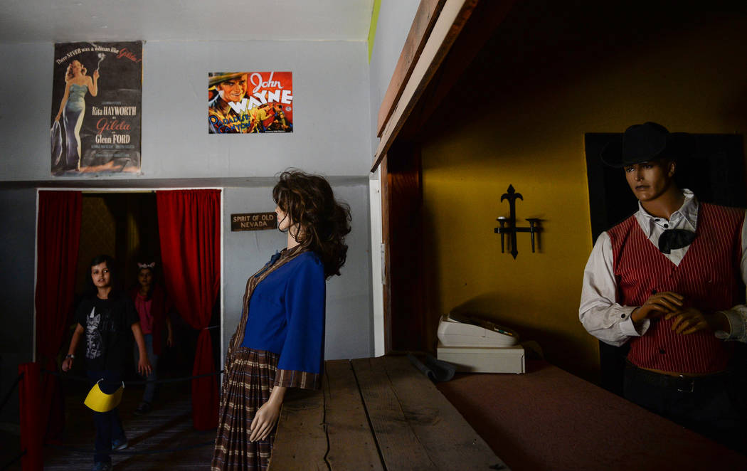 People walk by wax figures in the wax museum during the last day of operations at Bonnie Springs Ranch in Las Vegas, Sunday, March 17, 2019. (Caroline Brehman/Las Vegas Review-Journal) @carolinebr ...