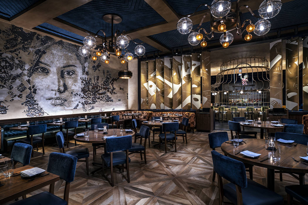“Scratching the Surface project” a 3-dimensional mural by VHILS, “King of the Cage” a scultpure by RISK (Kelly Graval) and “Endless Night” by Cleon Peterson at Greene St. Kitchen at ...