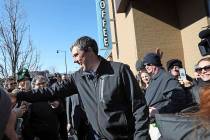 Democratic presidential candidate Beto O'Rourke greets a crowd outside Cargo Coffee on East Washington Avenue during a stop in Madison, Wis., Sunday, March 17, 2019. (AP Photo/Wisconsin State Jour ...