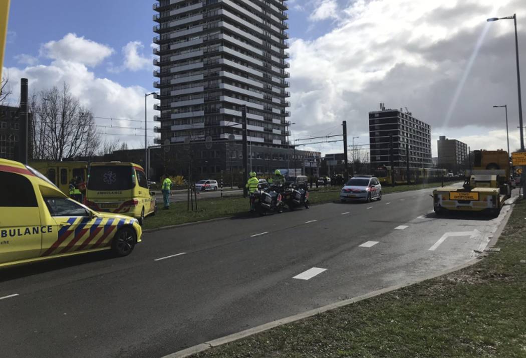 Emergency services attend the scene of a shooting in Utrecht, Netherlands, Monday March 18, 2019. Police in the central Dutch city of Utrecht say on Twitter that "multiple" people have b ...