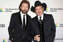 In this Dec. 2, 2018 file photo, Ronnie Dunn, left, and Kix Brooks attend the 41st Annual Kennedy Center Honors in Washington. Brooks & Dunn, comedic singer Ray Stevens and industry veteran Jerry ...