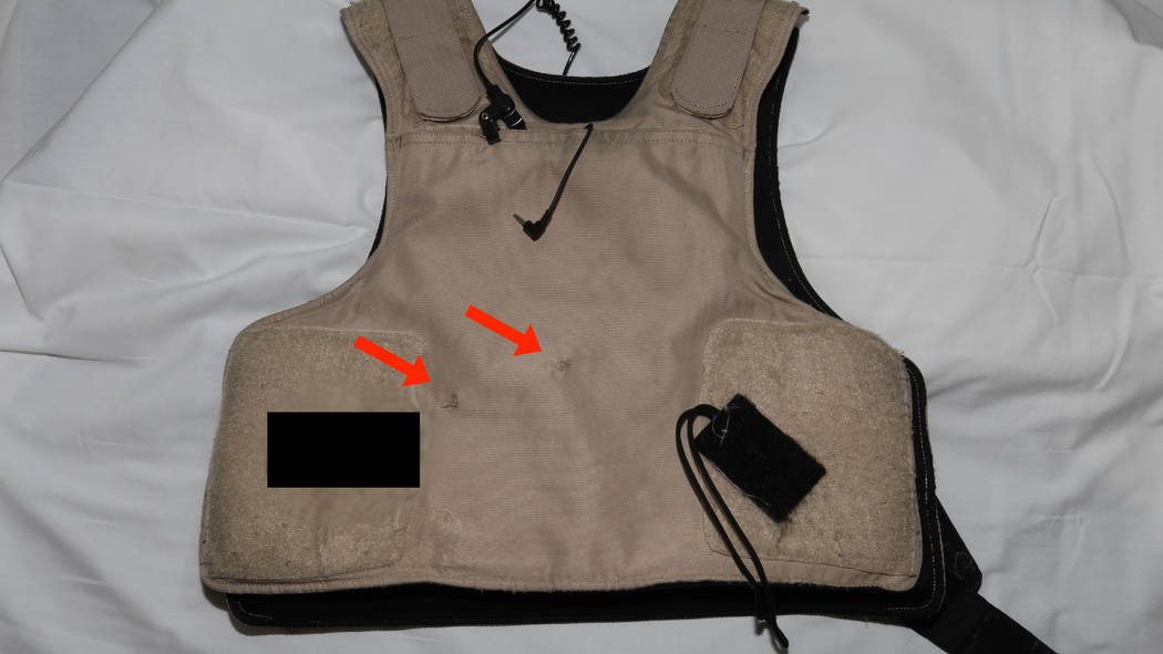 This photo released by the Las Vegas Metropolitan Police Department shows the bullet proof vest worn by a Las Vegas police officer who was shot following an armed robbery at the Bellagio hotel-cas ...