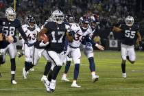 Oakland Raiders' Dwayne Harris (17) returns a punt for a touchdown against the Denver Broncos during the first half of an NFL football game in Oakland, Calif., Monday, Dec. 24, 2018. (AP Photo/D. ...