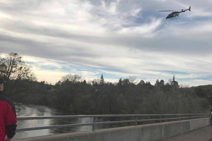In this Sunday, March 17, 2019 photo provided by the Stanislaus Consolidated Fire Protection District Authorities, fire and rescue personnel search for a 5-year-old girl who was swept away by a sw ...