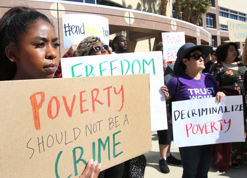 Protesters, including Sierra Bumanglag, rally to promote criminal justice reform outside of the Grant Sawyer Building on Monday, March 18, 2019, in Las Vegas. Bizuayehu Tesfaye Las Vegas Review-Jo ...