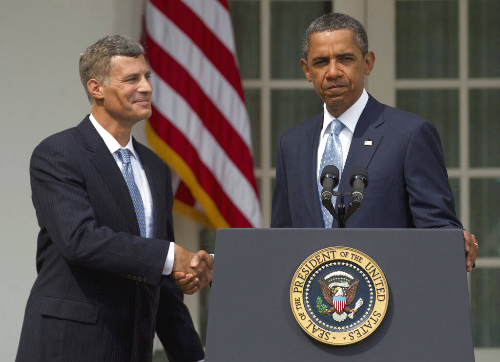 In this Aug. 29, 2011, file photo President Barack Obama shakes hands with Alan Krueger, left, as he announces him as chairman of the Council of Economic Advisers in the Rose Garden of the White H ...