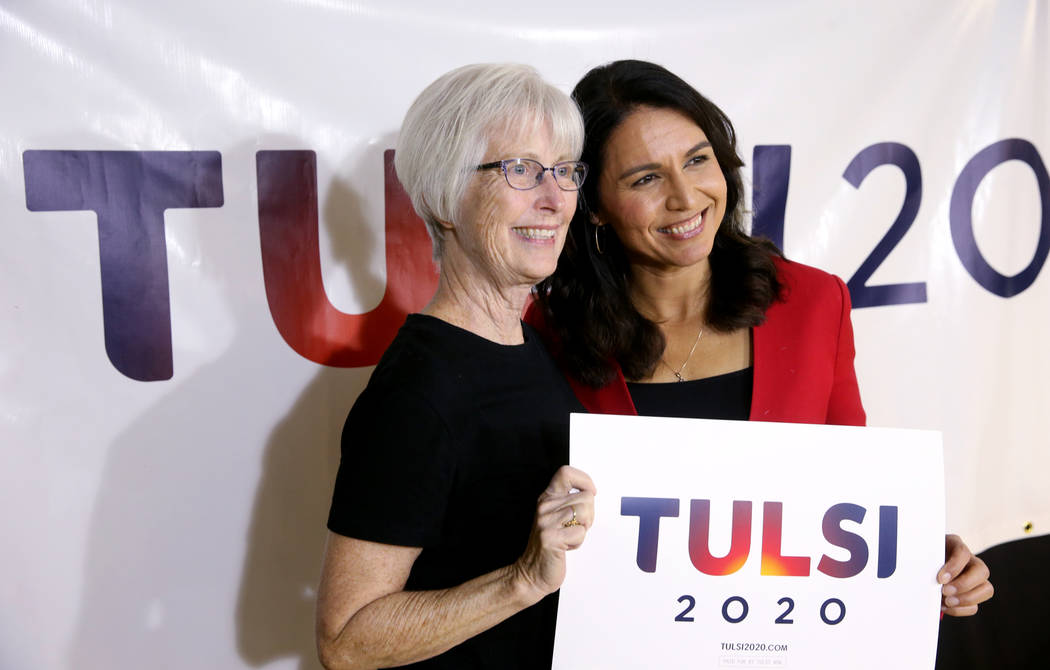 Presidential hopeful U.S. Rep. Tulsi Gabbard, D-Hawaii, right, with Mary Macioce during a meet and greet at the Asian Culture Center in downtown Las Vegas Monday, March 18, 2019. (K.M. Cannon/Las ...