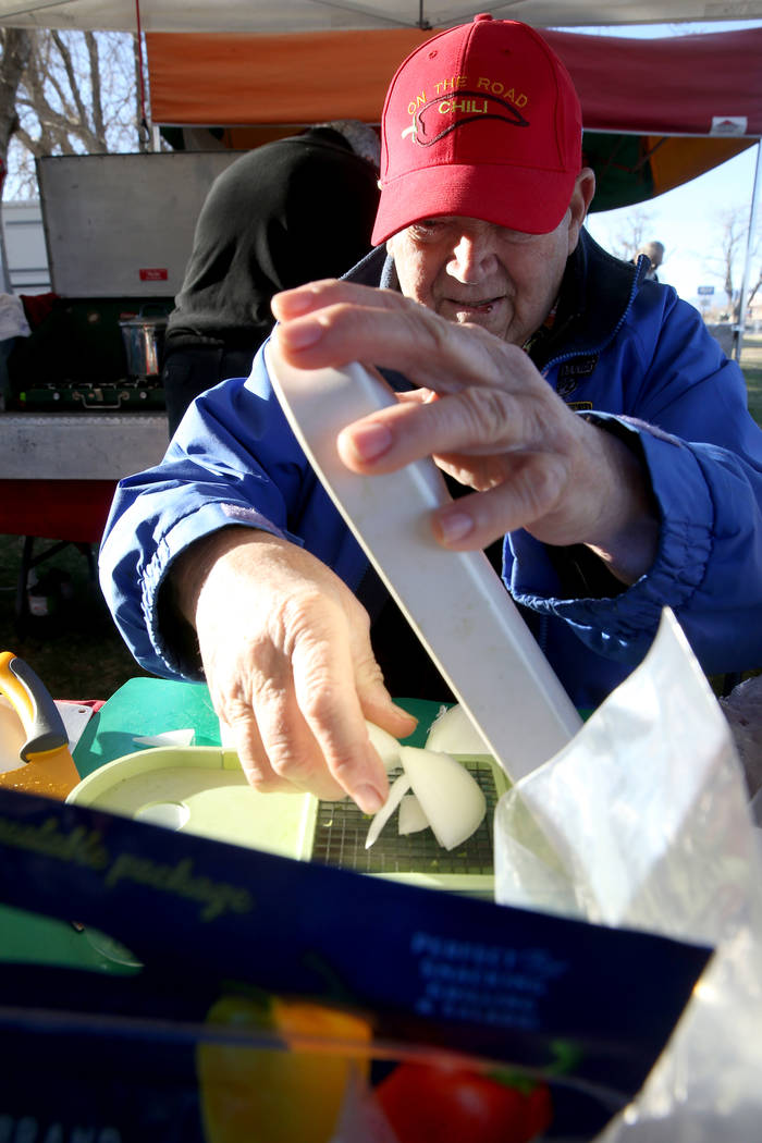 Chuck Harber, of Corona, California, chops onions in his booth at the Nevada State Chili Cook-off at Petrack Park in Pahrump Sunday, March 17, 2019. (K.M. Cannon/Las Vegas Review-Journal) @KMCanno ...