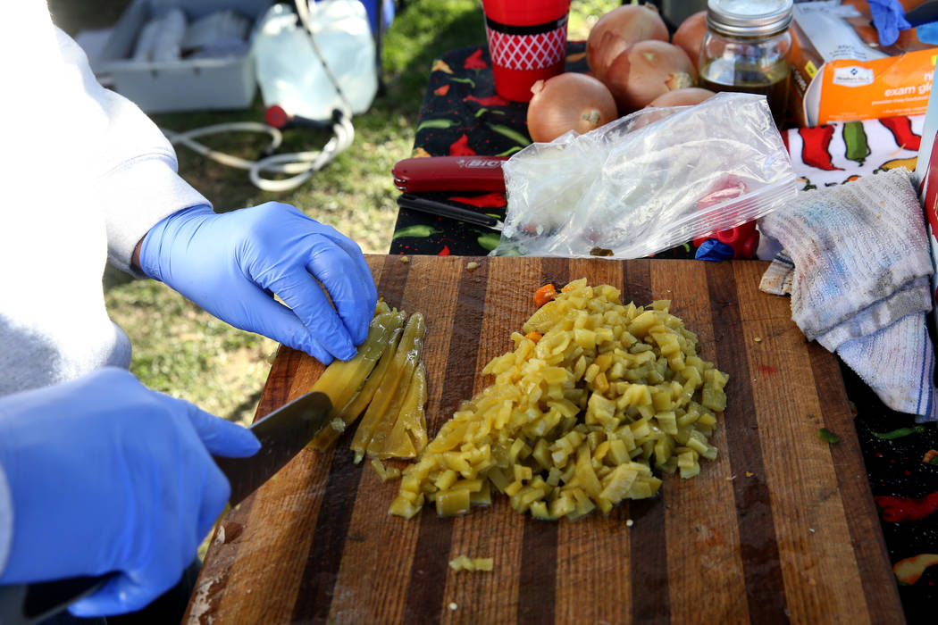 Brian Anthony of Laughlin prepares his chili ingredients in his booth at the Nevada State Chili Cook-off at Petrack Park in Pahrump Sunday, March 17, 2019. (K.M. Cannon/Las Vegas Review-Journal) @ ...