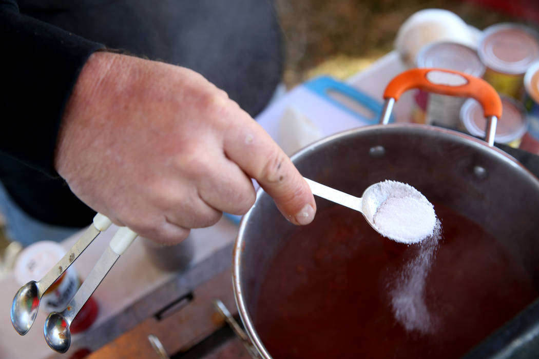 Tony Austin of San Bernardino, California, adds ingredients in his booth at the Nevada State Chili Cook-off at Petrack Park in Pahrump Sunday, March 17, 2019. (K.M. Cannon/Las Vegas Review-Journal ...