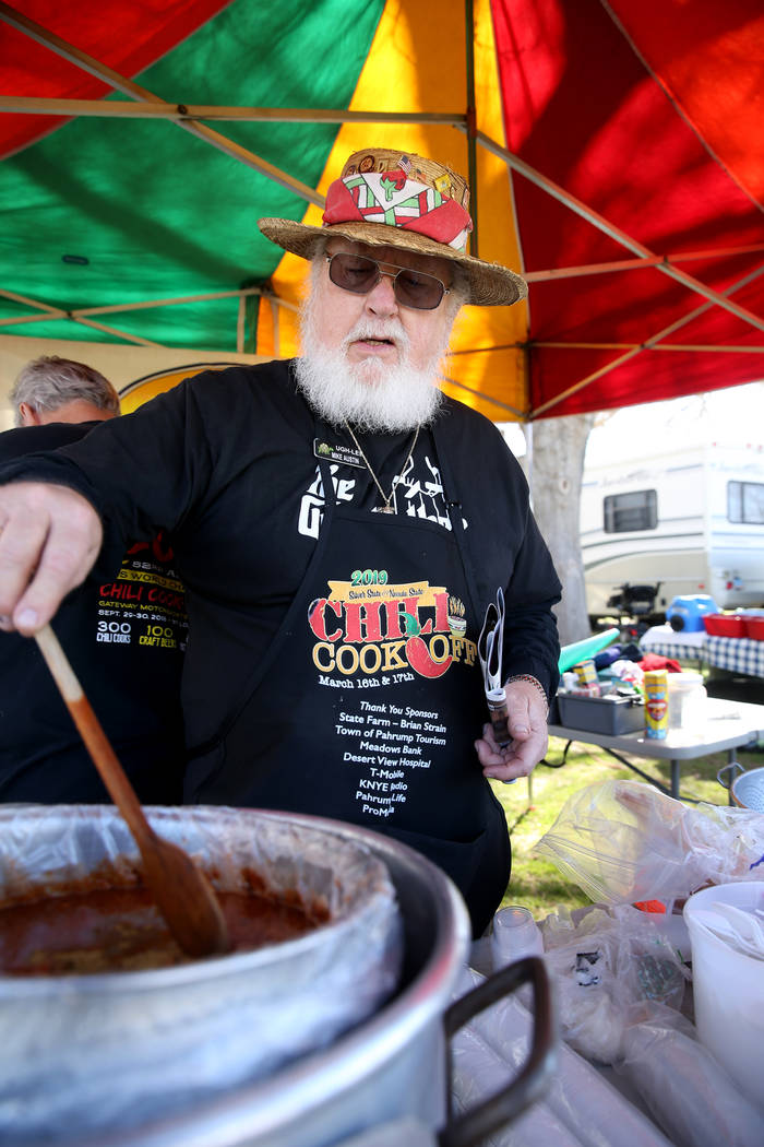 Mike Austin of San Bernardino, California, prepares his People's Choice chili in his booth at the Nevada State Chili Cook-off at Petrack Park in Pahrump Sunday, March 17, 2019. (K.M. Cannon/Las Ve ...
