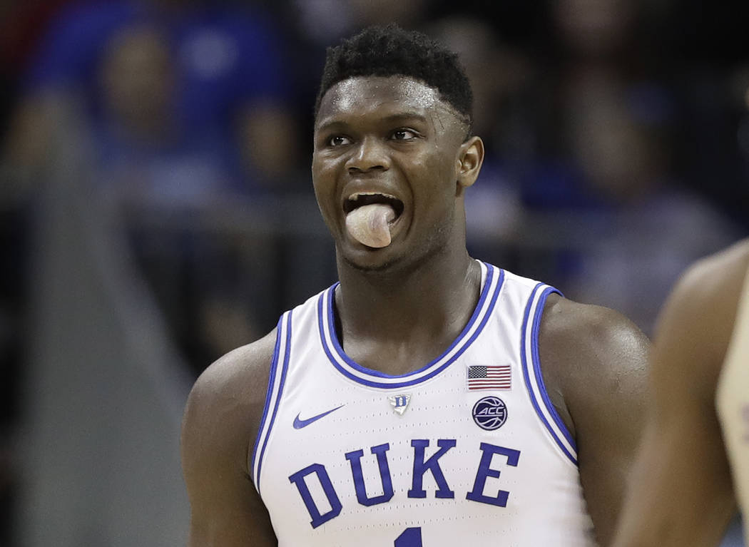 Duke's Zion Williamson (1) reacts during the second half against Florida State in the NCAA college basketball championship game of the Atlantic Coast Conference tournament in Charlotte, N.C., Satu ...