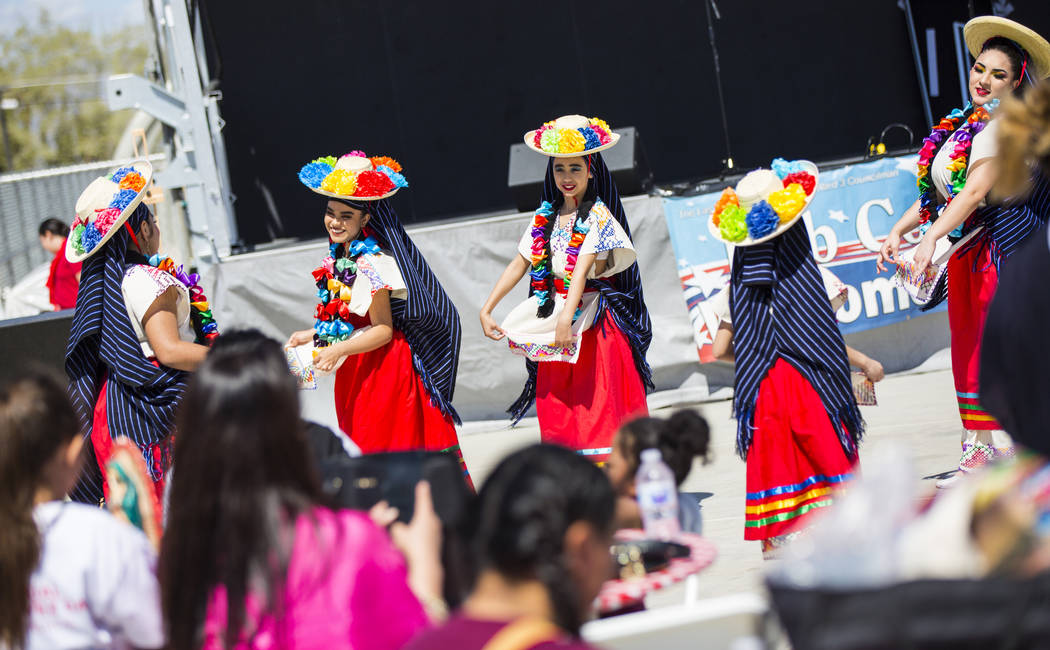 Members of the Mexico Vivo dance company perform a folklorico dance during the Cesar Chavez Day festival at Freedom Park in Las Vegas on Saturday, March 23, 2019. (Chase Stevens/Las Vegas Review-J ...