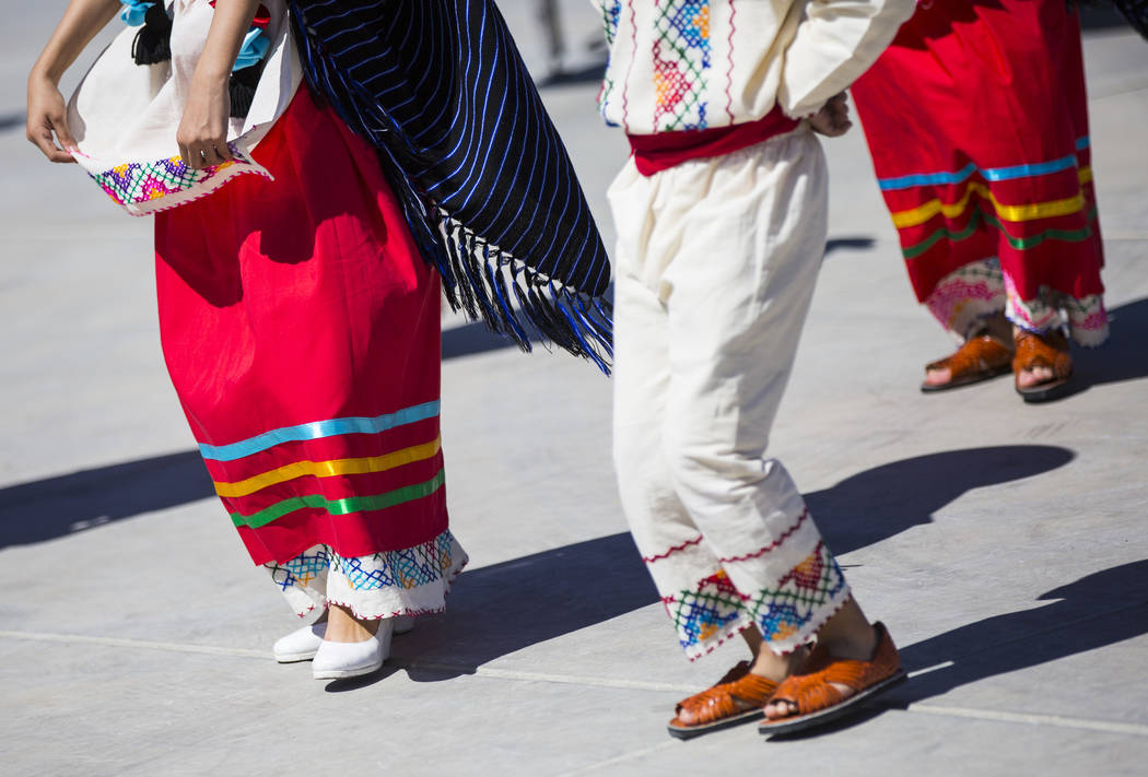 Members of the Mexico Vivo dance company perform a folklorico dance during the Cesar Chavez Day festival at Freedom Park in Las Vegas on Saturday, March 23, 2019. (Chase Stevens/Las Vegas Review-J ...