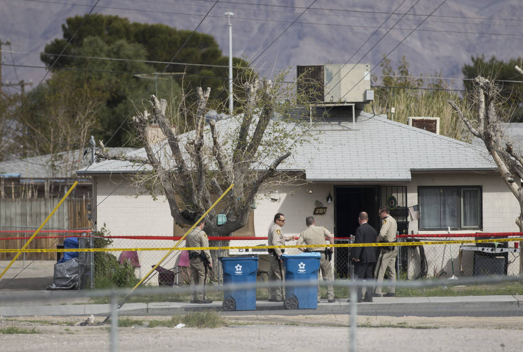 Metro works the scene of an officer-involved shooting in the 500 block of N. 9th Street on Tuesday, March 19, 2019, in Las Vegas. (Benjamin Hager Review-Journal) @BenjaminHphoto