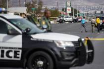 Metro works the scene of an officer-involved shooting in the 500 block of N. 9th Street on Tuesday, March 19, 2019, in Las Vegas. (Benjamin Hager Review-Journal) @BenjaminHphoto