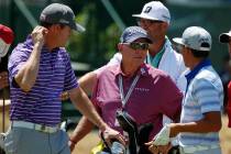 Golf instructor Butch Harmon, middle, talks with Jimmy Walker, left, and Rickie Fowler on the 18th hole during a practice round for the U.S. Open golf tournament at Chambers Bay on Tuesday, June 1 ...