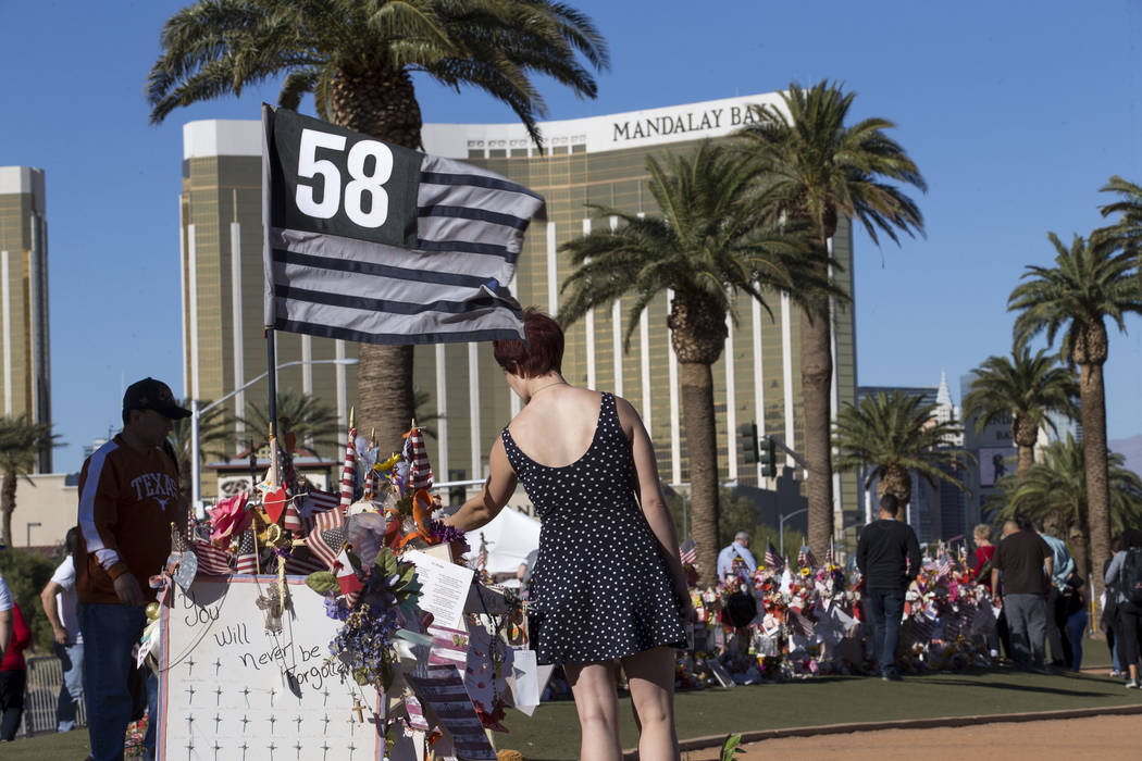 The crosses and mementos left behind by visitors at a memorial for Route 91 Harvest shooting victims at the Welcome to Fabulous Las Vegas sign, Thursday, Nov. 9, 2017. Richard Brian Las Vegas Revi ...