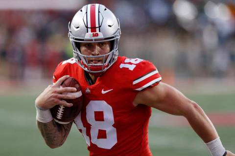In this Sept. 22, 2018, file photo, Ohio State quarterback Tate Martell runs against Tulane during an NCAA college football game in Columbus, Ohio. (AP Photo/Jay LaPrete, File)