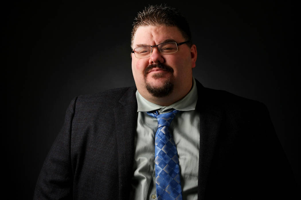 Adam Hill, reporter, poses for a portrait at the Las Vegas Review-Journal photos studio, Las Vegas, Jan. 17, 2017. (Elizabeth Brumley/Las Vegas Review-Journal) @EliPagePhoto