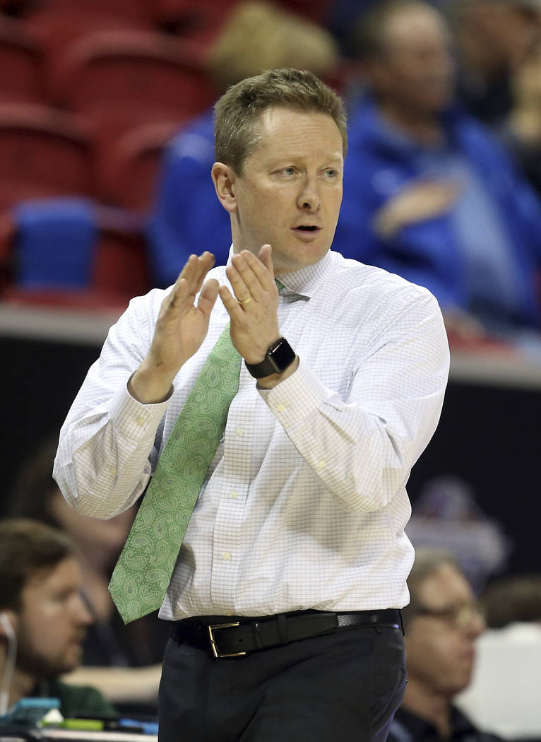 Colorado State head coach Niko Medved instructs his team during the second half of an NCAA college basketball game against Boise State in the Mountain West Conference tournament Wednesday, March 1 ...