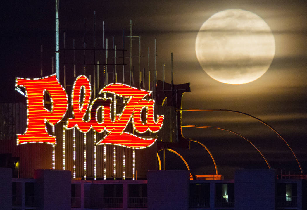 A super snow moon rises over the Plaza in downtown Las Vegas as seen from the World Market Center on Tuesday, Feb. 19, 2019. (Chase Stevens/Las Vegas Review-Journal) @csstevensphoto