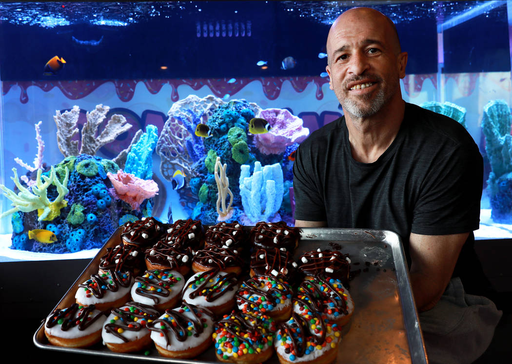 Brett Raymer, a star of the TV show "Tanked" and a partner in Donut Mania, poses for a photo at his shop in Las Vegas on Friday, March 9, 2018. (Las Vegas Review-Journal)