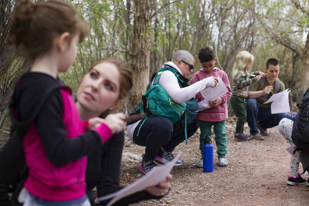 Lauryn Ricigliano helps her son Asante Ricigliano-Vaughn during an activity to learn about nests and birds during the Nature Tykes program at Clark County Wetlands Park in Las Vegas, Wednesday, Ma ...