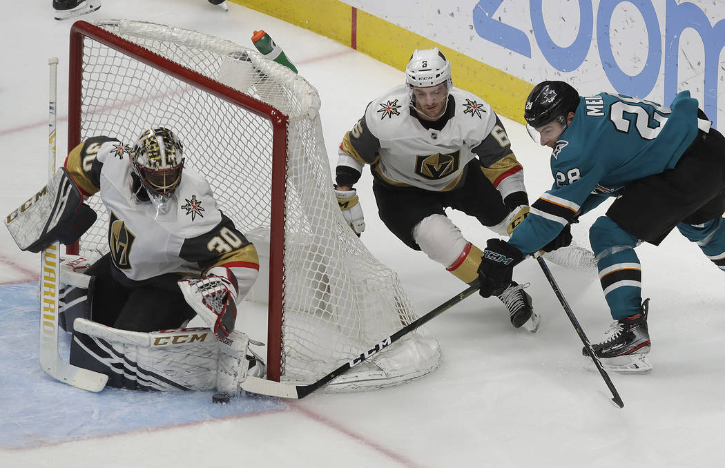 Vegas Golden Knights goaltender Malcolm Subban, left, defends a shot attempt by San Jose Sharks right wing Timo Meier, right, during the third period of an NHL hockey game in San Jose, Calif., Mon ...