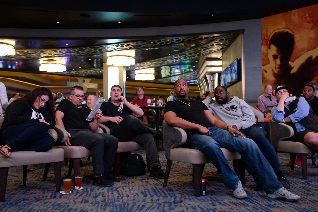 Fans watch the first round of the NCAA men's college basketball tournament at the newly opened sportsbook inside The Strat in Las Vegas, Thursday, March 21, 2019. (Caroline Brehman/Las Vegas Revie ...
