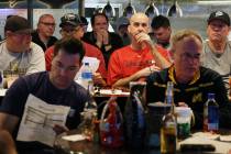 Fans watch a basketball game during the first day of the NCAA basketball tournament at the Westgate sports book in Las Vegas on Thursday, March 21, 2019. (Bizuayehu Tesfaye Las Vegas Review-Journa ...