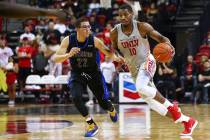 UNLV Rebels forward Shakur Juiston (10) brings the ball up court against UC Riverside Highlanders guard Dominick Pickett (22) during the first half of a basketball game at the Thomas & Mack Ce ...