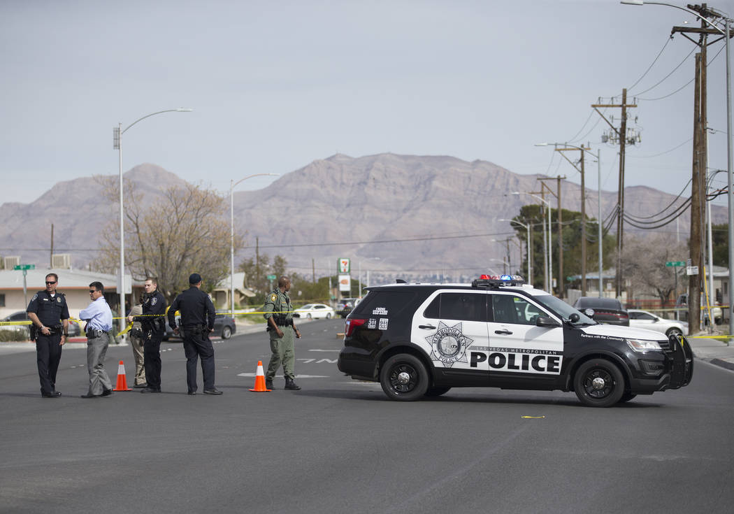 Metro works the scene of an officer-involved shooting in the 500 block of N. 9th Street on Tuesday, March 19, 2019, in Las Vegas. (Benjamin Hager Review-Journal) @BenjaminHphoto