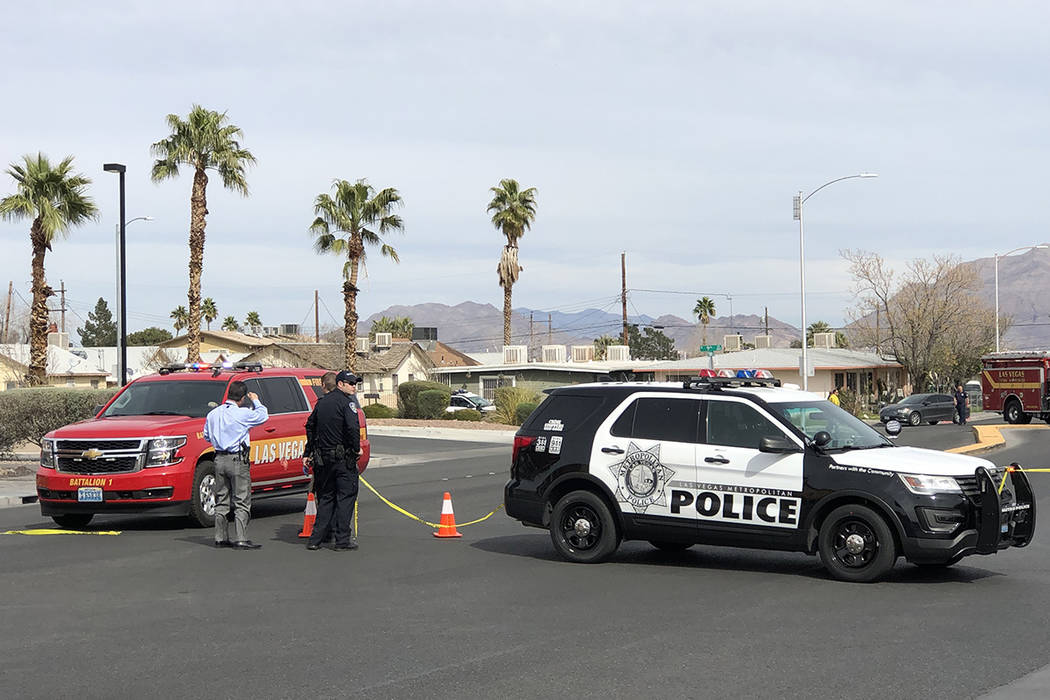 Metro works the scene of an officer-involved shooting in the 500 block of North 9th Street on Tuesday, March 19, 2019, in Las Vegas. (Benjamin Hager Review-Journal) @BenjaminHphoto