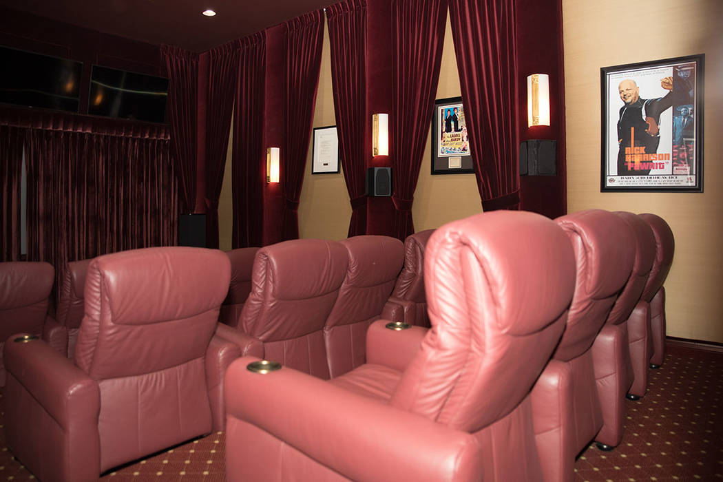 There’s a 12-seat home theater with a 150-inch screen and a curtain. (Tonya Harvey Real Estate Millions)