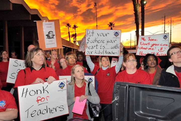 Clark County Education Association supporters listen to CCEA union president Ruben Murillo during a rally outside the Edward Greer Education Center at 2832 E. Flamingo Road on Thursday, Jan. 26, 2 ...