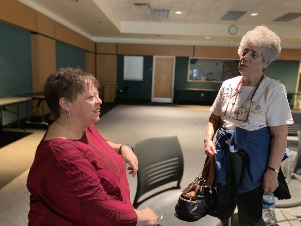 Kathy Kunkle (left) and Gloria Castricone speak following the presentation "Bella Italia" at th ...