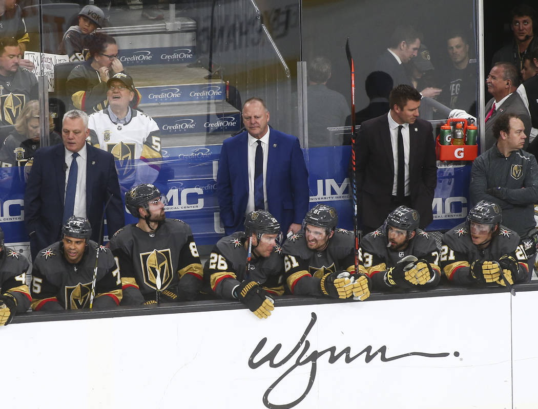 Golden Knights head coach Gerard Gallant, in blue, looks on during the third period of an NHL hockey game against the Winnipeg Jets at T-Mobile Arena in Las Vegas on Thursday, March 21, 2019. (Cha ...