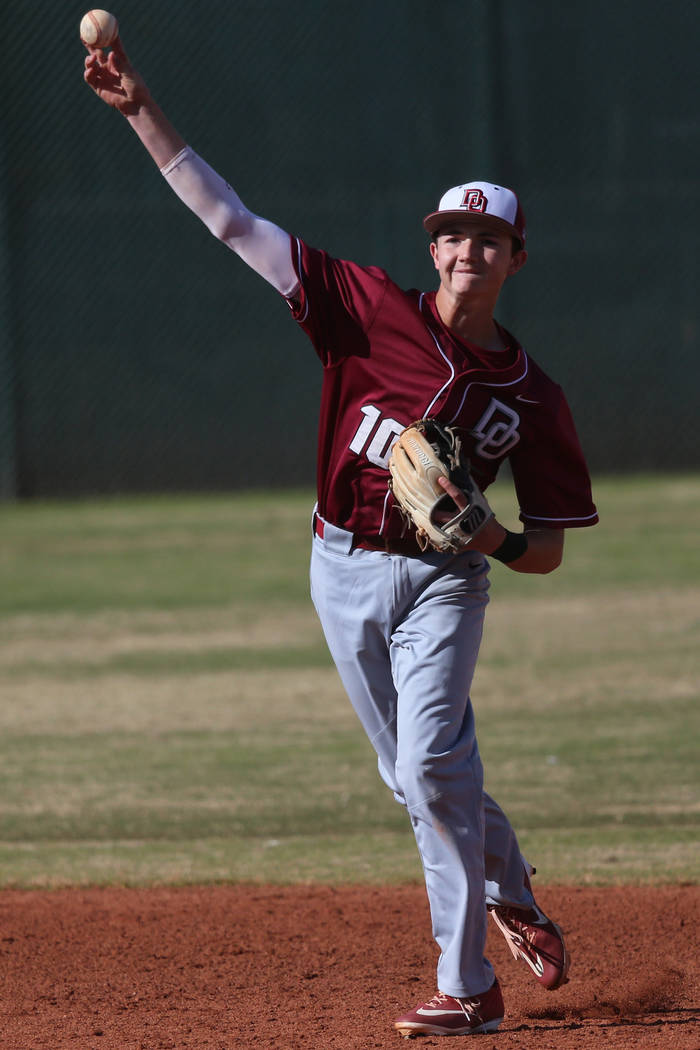 Desert Oasis' Colby Smith (10) throws a ground-ball to first base for an out against Bishop Gorman in the baseball game at Bishop Gorman High School in Las Vegas, Thursday, March 21, 2019. Erik Ve ...